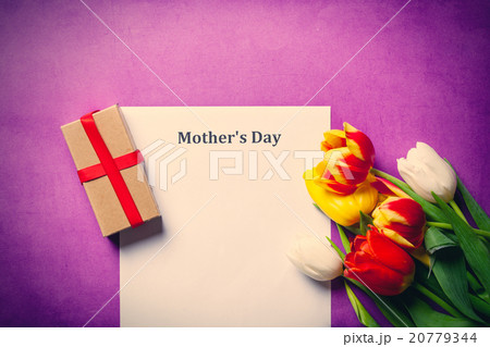 tulips and paper with words Mothers day 20779344