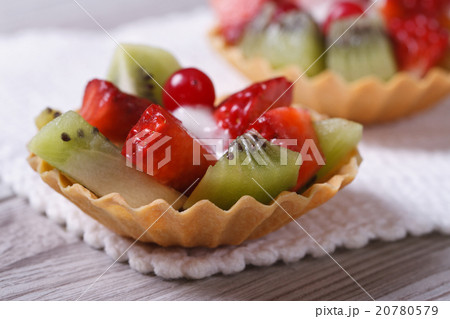 tartlets with strawberries, kiwi and cranberries 20780579