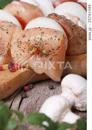 Raw chicken barbecue on wooden skewers macro 20781489