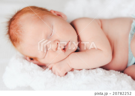 Newborn baby peacefully sleeping Newborn baby peacefully sleeping 20782252