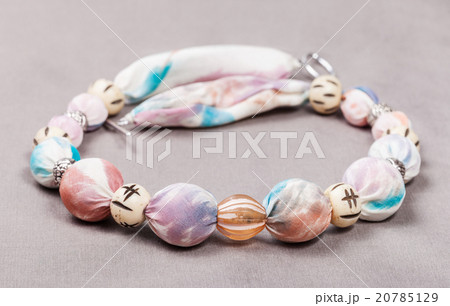 textile necklace from pink silk batik on gray 20785129