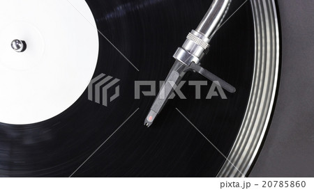 Dj needle stylus on spinning record Dj needle stylus on spinning record 20785860