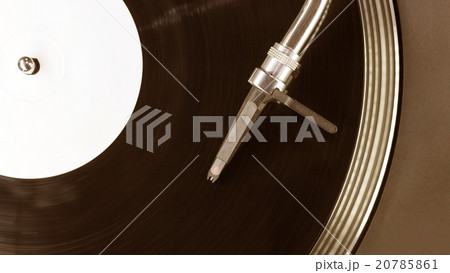 Dj needle stylus on spinning record Dj needle stylus on spinning record 20785861