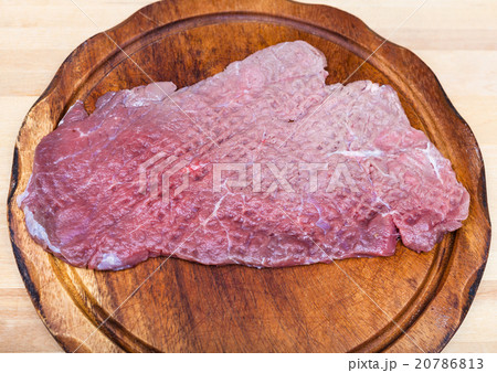 top view of beaten piece of meat 20786813