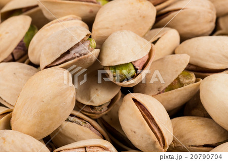 Pistachio nuts arranges as background Pistachio nuts arranges as background 20790704