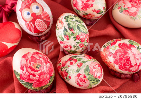 Decorated Easter eggs on red silk Decorated Easter eggs on red silk 20796880