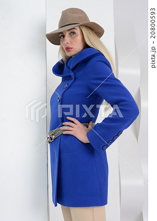 Girl in studio posing at coat 20800593