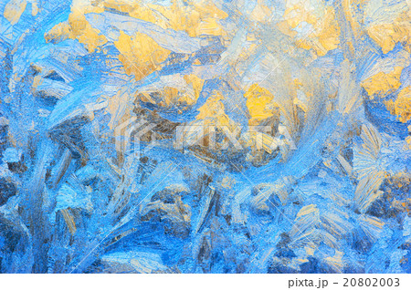 Window glass covered with ice pattern 20802003