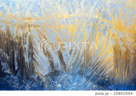 Window glass covered with ice pattern 20802004