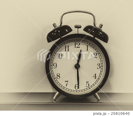 retro alarm clock on table 20810640
