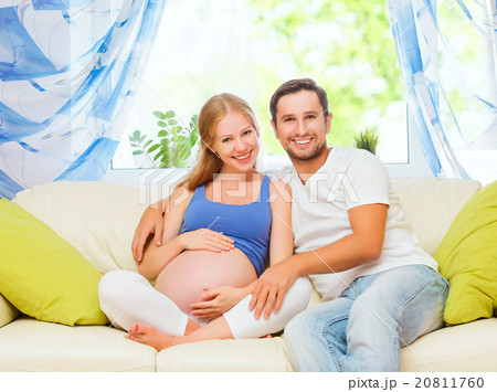 happy family in anticipation of the birth of baby. Pregnant woma happy family in anticipation of the birth of baby. Pregnant woma 20811760