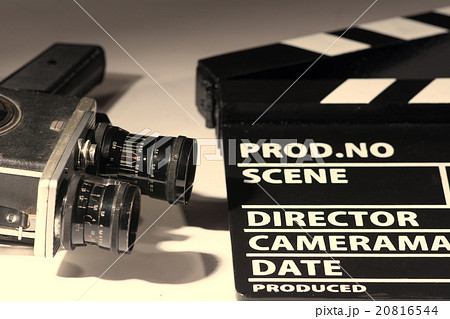 Old camera with two lenses and film clapper 20816544