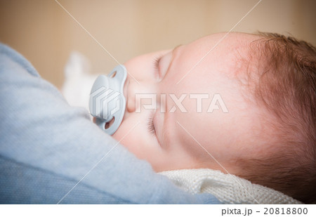 picture of a newborn baby curled up sleeping picture of a newborn baby curled up sleeping 20818800