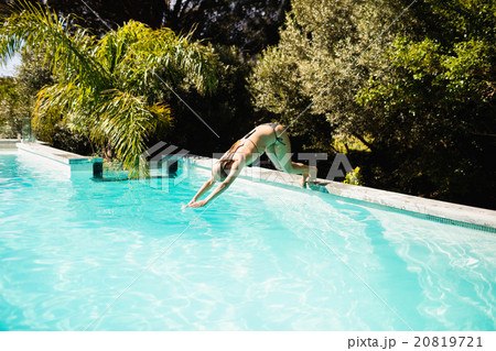 Fit blonde diving in the pool Fit blonde diving in the pool 20819721