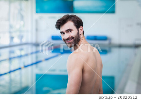 Handsome man smiling at camera 20820512