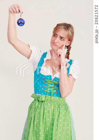 woman has doubts about your Christmas decorations woman has doubts about your Christmas decorations 20821572