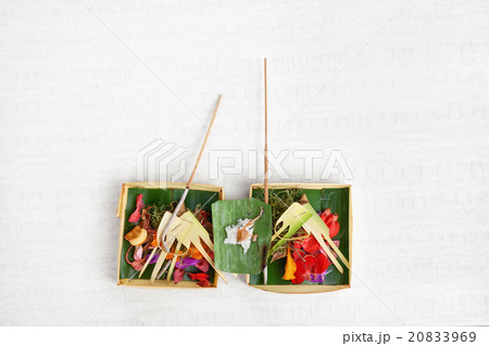 Traditional balinese offering on light background Traditional balinese offering on light background 20833969