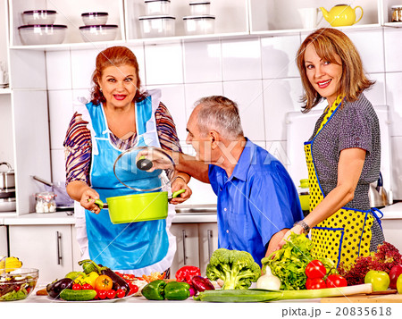 Family cooking at kitchen. Family cooking at kitchen. 20835618