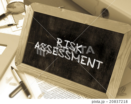 Handwritten Risk Assessment on a Chalkboard. Handwritten Risk Assessment on a Chalkboard. 20837218