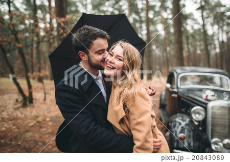 Romantic fairytale wedding couple kissing and Romantic fairytale wedding couple kissing and 20843089