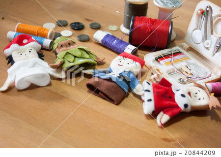 Handmade Christmas doll finger on wood background 20844209