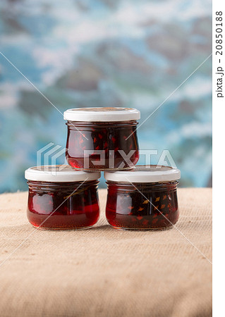 Three jam jars with cones 20850188