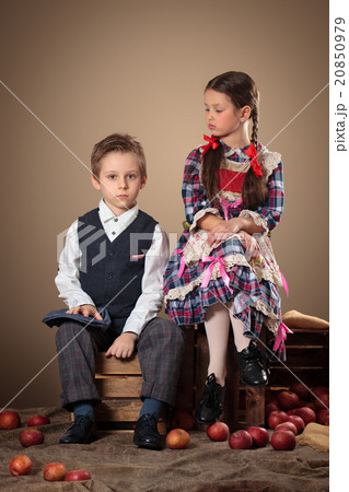 Two kids and apples. 20850979