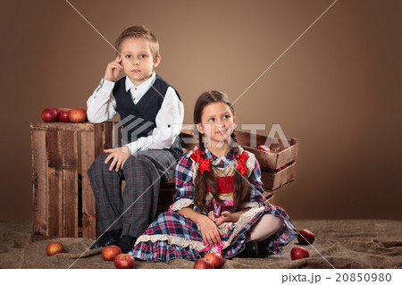 Two kids and apples. Two kids and apples. 20850980