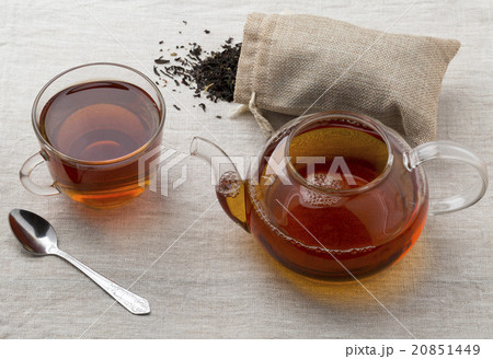Glass cup and teapot freshly brewed black tea Glass cup and teapot freshly brewed black tea 20851449