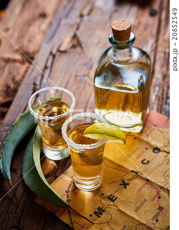 Tequila shot with lime and sea salt  20852549