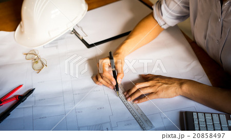 Creative architect projecting on the big drawing 20858497
