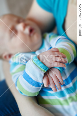 young mother with her baby son in arms young mother with her baby son in arms 20872225