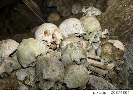 Pile of skulls by the entrance to TampangAllo cave 20874804