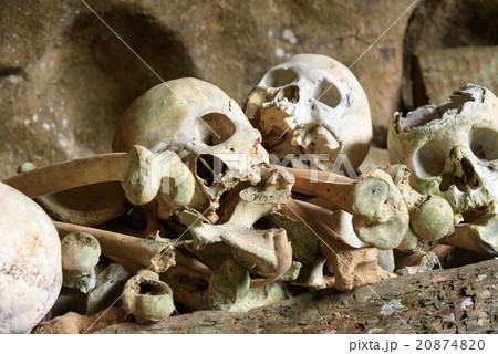 Pile of skulls by the entrance to TampangAllo cave Pile of skulls by the entrance to TampangAllo cave 20874820