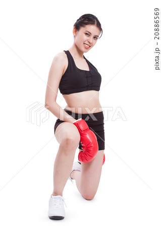 Fitness woman with the red boxing gloves Fitness woman with the red boxing gloves 20886569