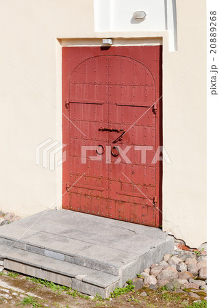 Old red massive gate in orthodox church 20889268