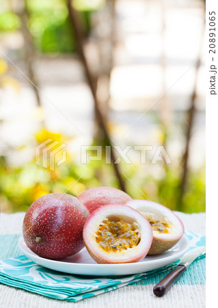 Passion fruits on blue napkin Outdoor background Passion fruits on blue napkin Outdoor background 20891065