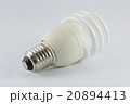 Energy saving fluorescent light bulb on white 20894413