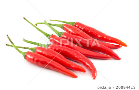 Red chili peppers isolated on a white background Red chili peppers isolated on a white background 20894415