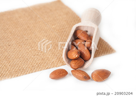 almonds in wood spoon 20903204