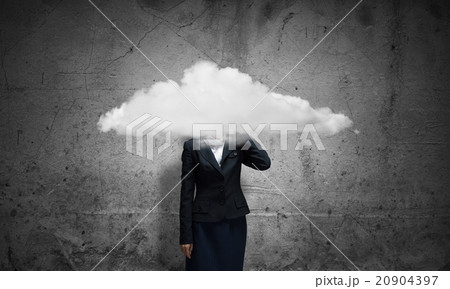 Cloud headed businesswoman 20904397
