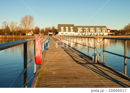 Wharf scaffold above  sea at harbor. Calm water  20906017