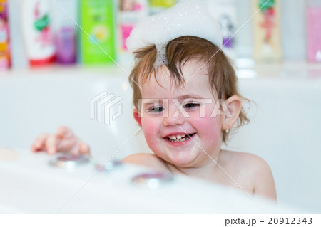 little girl taking spa bath little girl taking spa bath 20912343