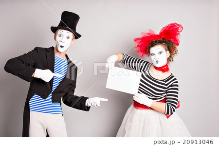 Portrait of happy smiling young actors showing 20913046