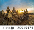 Stones pyramid on sand symbolizing zen 20915474