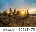 Stones pyramid on sand symbolizing zen 20915475
