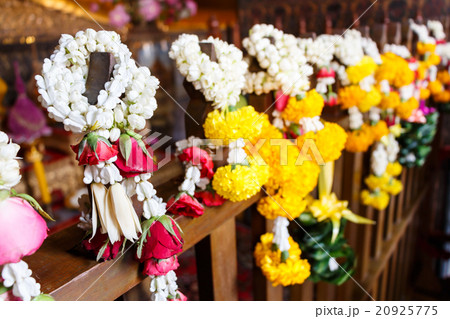 garlands hang on wood at Wat Pho 20925775