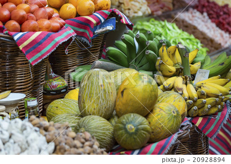 A lot of tropical fruits in outdoor market 20928894
