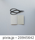 Small opened notebook and Japanese scissors 20945642