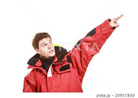 Young man sailor in red wind jacket. Sailing. Young man sailor in red wind jacket. Sailing. 20957830